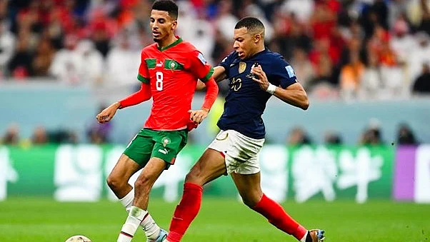 Flashback to Qatar 2022: Aboukhlal (L) is challenged by Mbappe in the semi-final