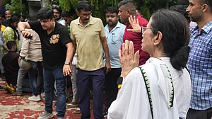 Mamata Banerjee speaks to TMC workers after a clash with the BJP in Kolkata, 8 July