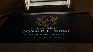 Trump Force One touches down at the newly renamed Trump International Airport.