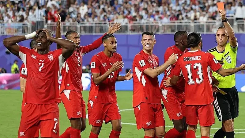 Embolo (No.7) being sent off after seeing a second yellow card against Argentina.