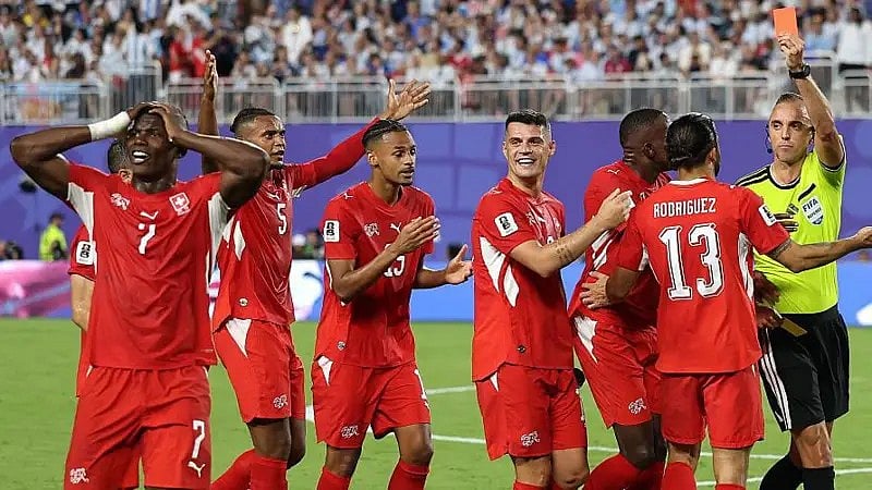 Embolo (No.7) being sent off after seeing a second yellow card against Argentina.