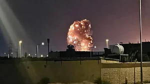 Smoke billows following a US airstrike on an Iranian target.