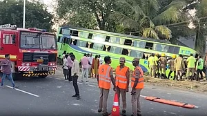Officials inspect the accident site in Madurai district.