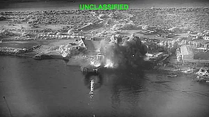 Image from US Central Command video shows an explosion at Iran's Bandar Abbas Naval Base.