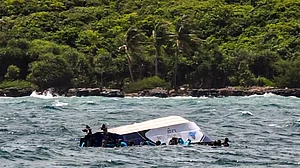 A speedboat carrying 32 Indian tourists and four Vietnamese crew members capsized