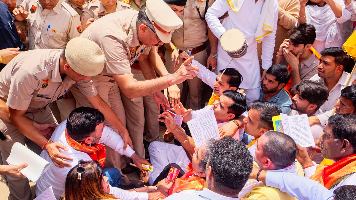 Congress workers protest outside the BJP office in Gurugram over the Ram Mandir donation row, 14 July