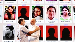 Rahul Gandhi with the father of a student who allegedly took her own life after the NEET fiasco