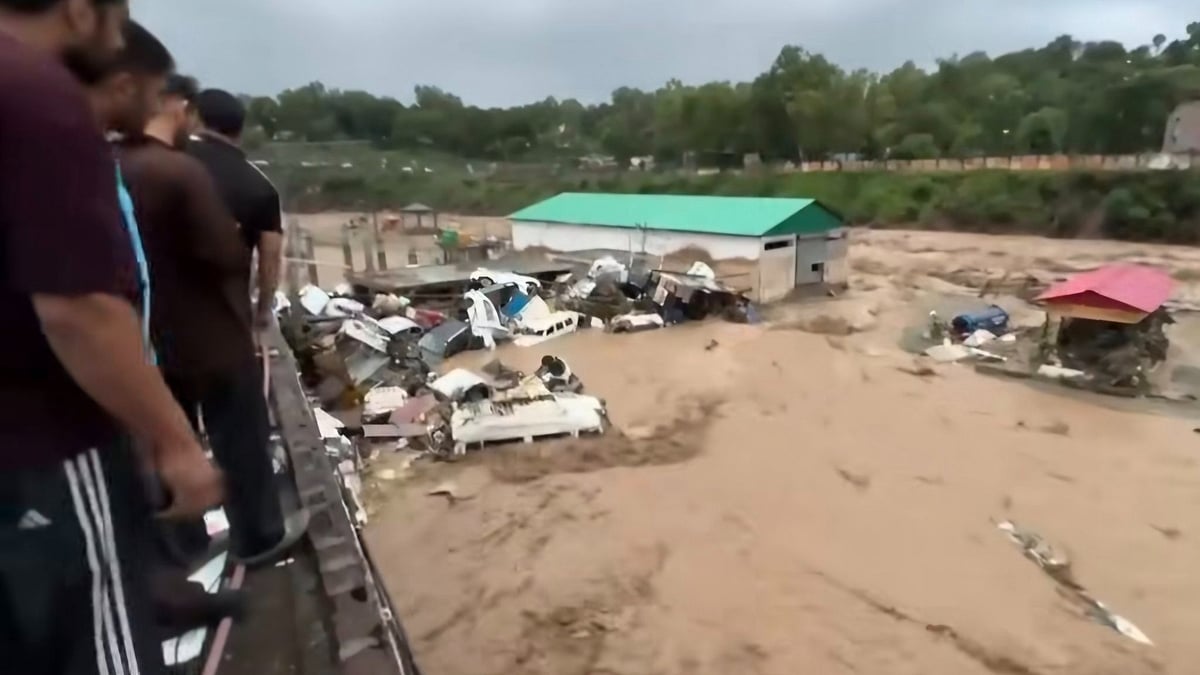 Vehicles pile up in Rajouri's Bela area as flash floods wreak havoc.