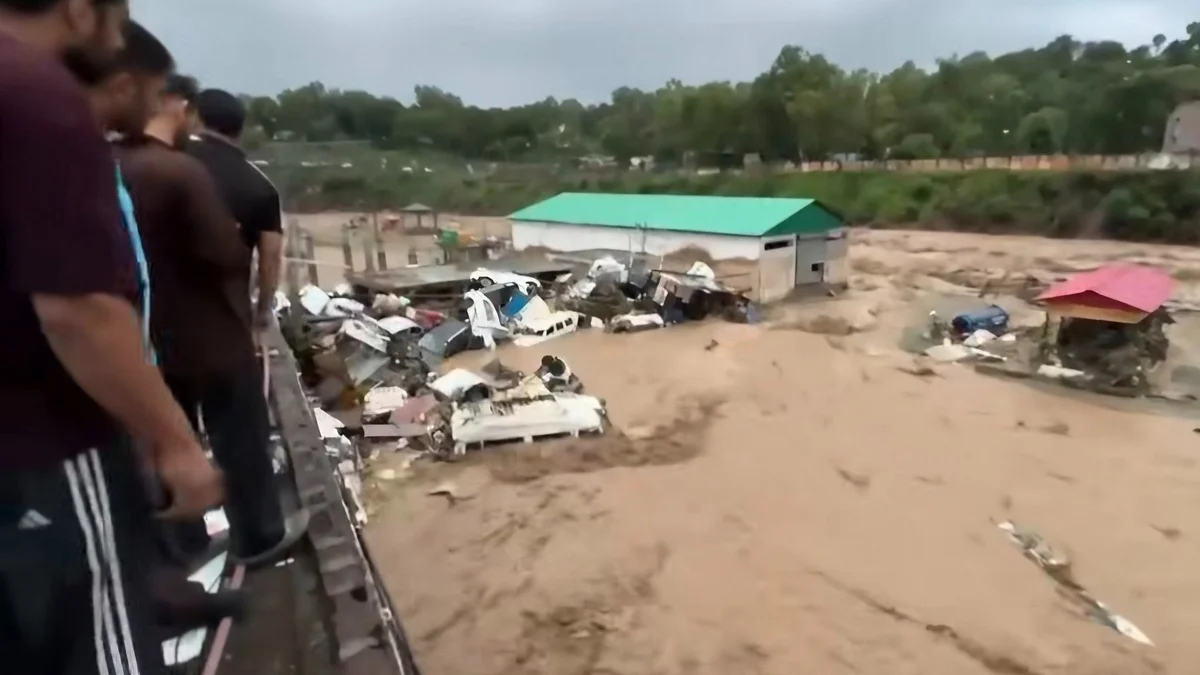 Vehicles pile up in Rajouri's Bela area as flash floods wreak havoc.