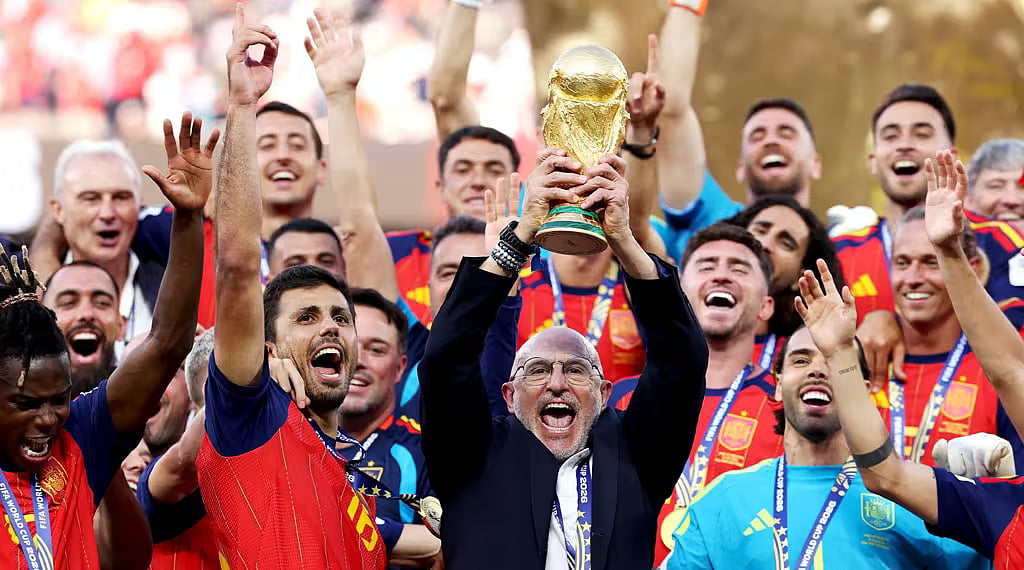 Spanish team rejoice with head coach and mastermind Le Fuente.