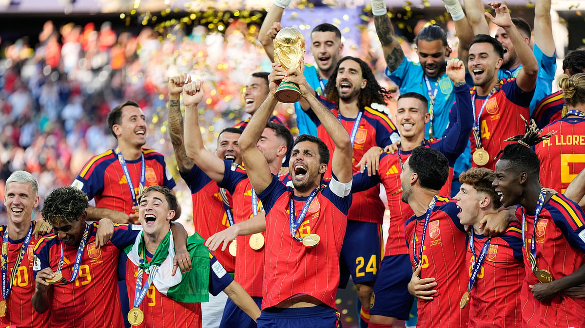 Spain's Rodri lifts the World Cup trophy after Spain beat Argentina in the final in New Jersey.
