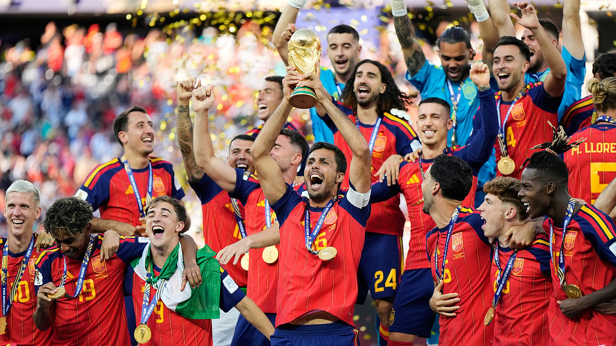 Spain's Rodri lifts the World Cup trophy after Spain beat Argentina in the final in New Jersey.