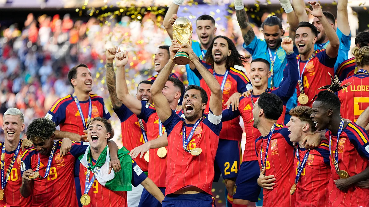 Spain's Rodri lifts the World Cup trophy after Spain beat Argentina in the final in New Jersey.