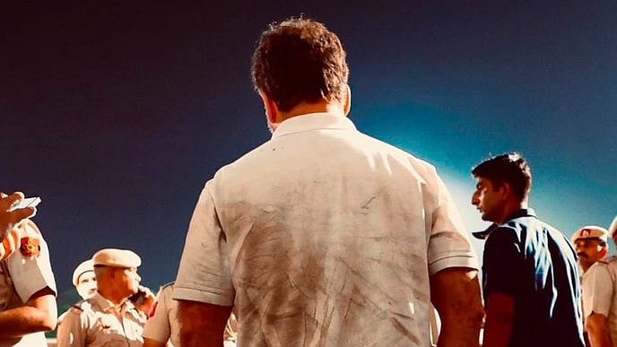 Rahul Gandhi walking out of detention late on Tuesday night