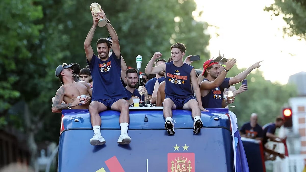 Rodri, Golden Ball winner and Spain captain, with the team at a open top bus parade in Madrid