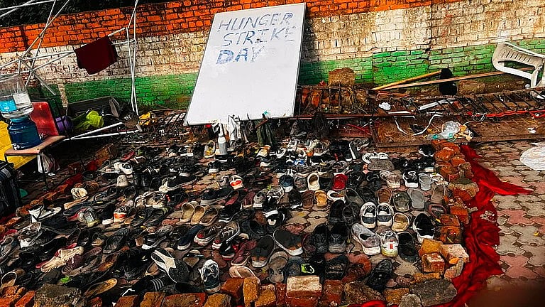 Footwear left behind after police action on students protesting NEET paper leaks