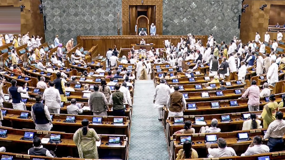 Opposition members protest in the well of the Lok Sabha, 23 July 23