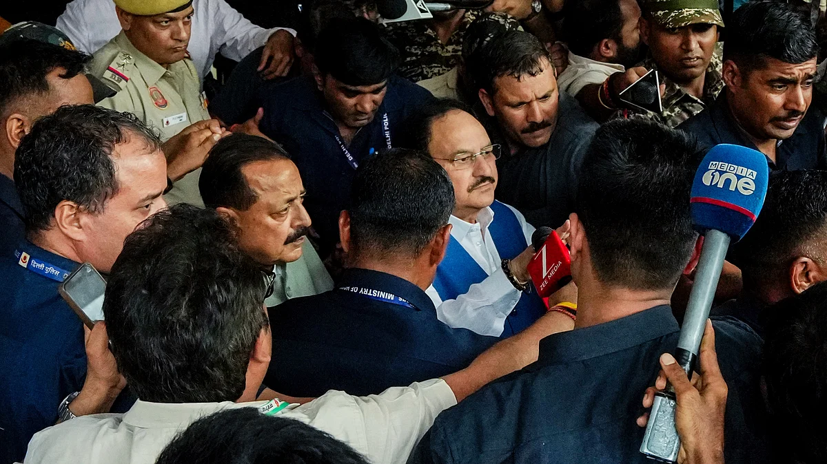 Union ministers J.P. Nadda and Jitendra Singh leave after the meeting, 24 July