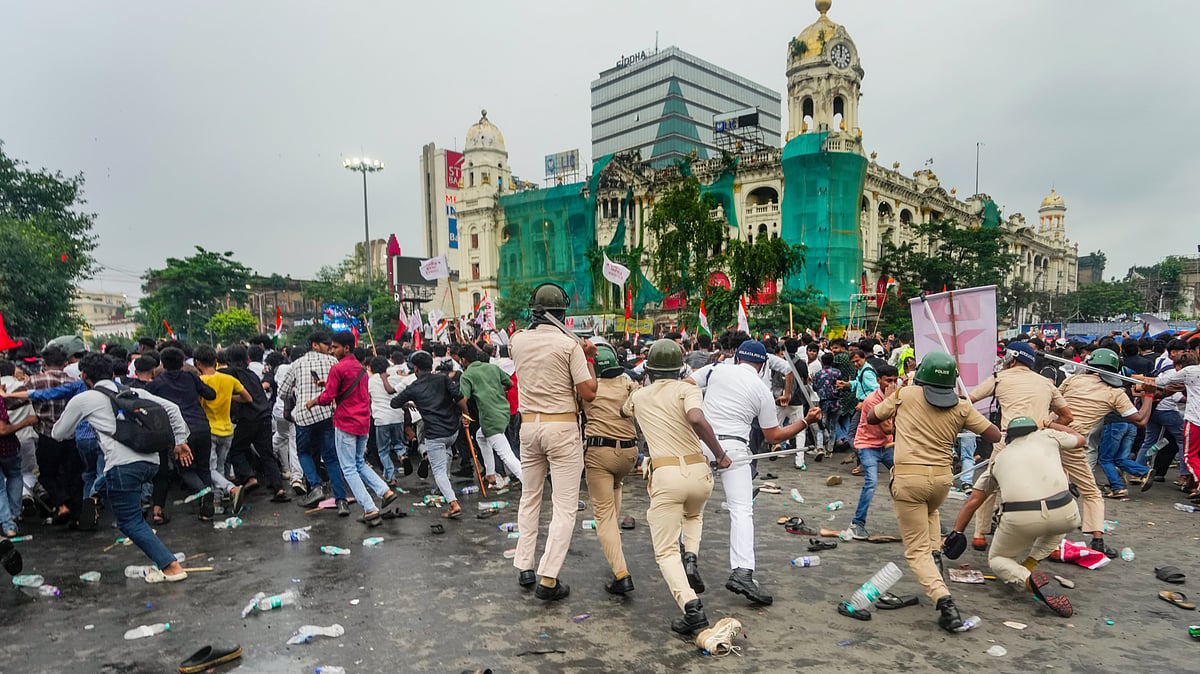 A police lathi charge during the joint protest rally by Left students' bodies and CJP in Kolkata, 24 July