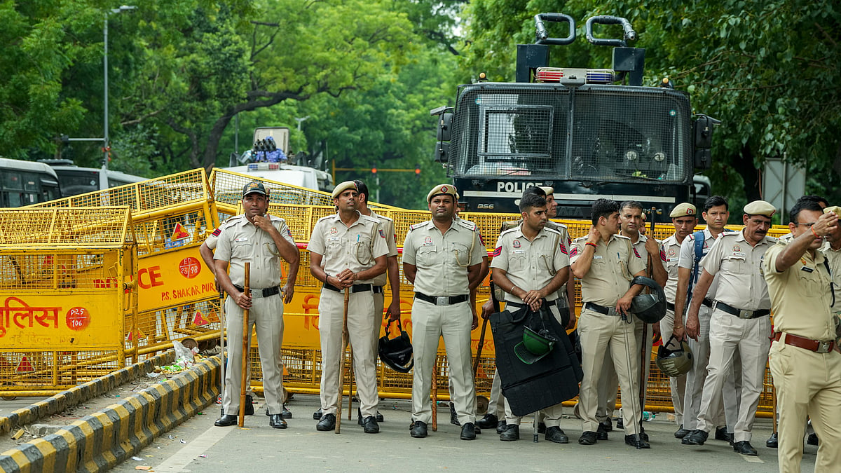 Delhi Police personnel at barricades