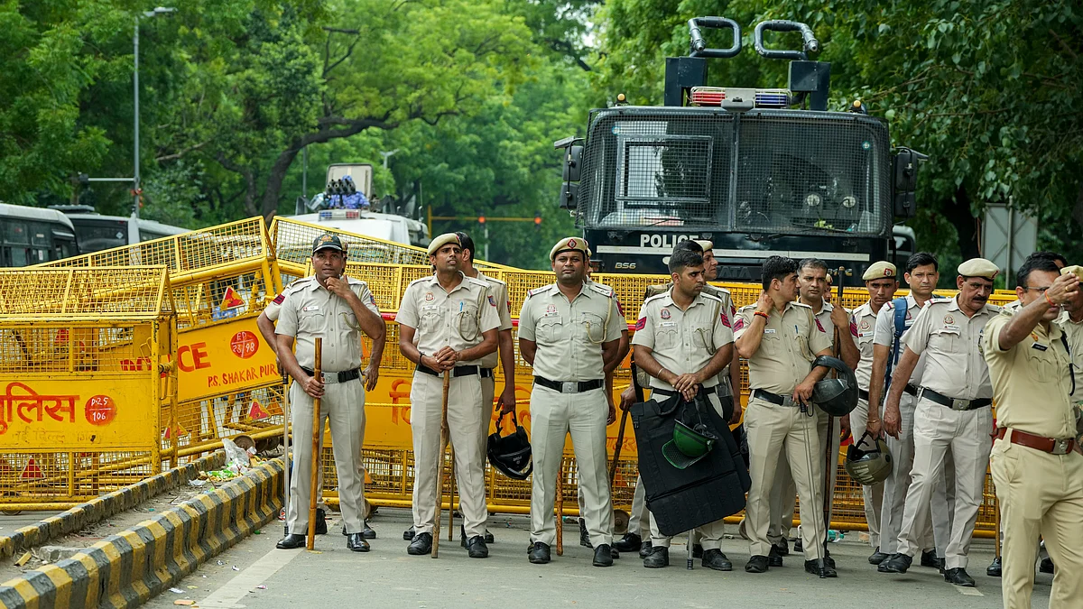 Delhi Police personnel at barricades