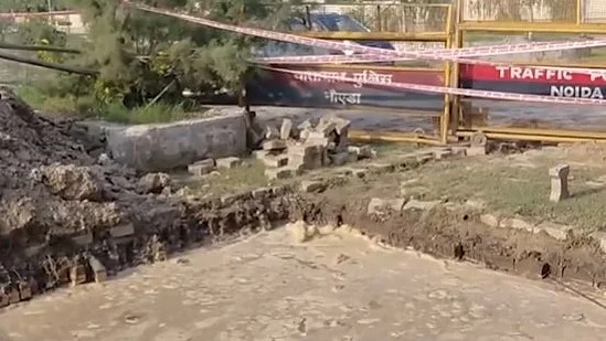 Borewell pit dug by Greater Noida Authority filled with rainwater following recent showers.