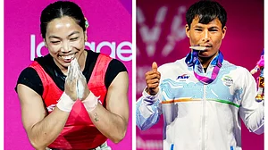 Mirabai Chanu (L) and Rishikanta Singh in Glasgow