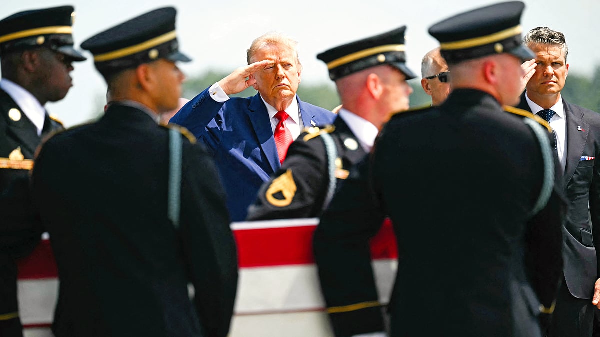 Donald Trump and his secretary of war Pete Hegseth (far right) putting a brave face on setbacks