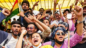 Protesters celebrate after the resignation of Dharmendra Pradhan, at Jantar Mantar, 25 July