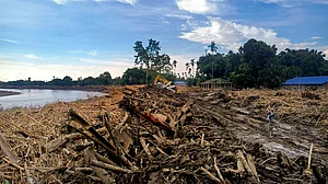 Families cling to hope as floods sever all communication.
