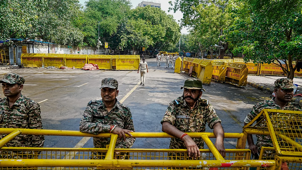 Security personnel keep vigil near the protest site at Jantar Mantar in New Delhi.