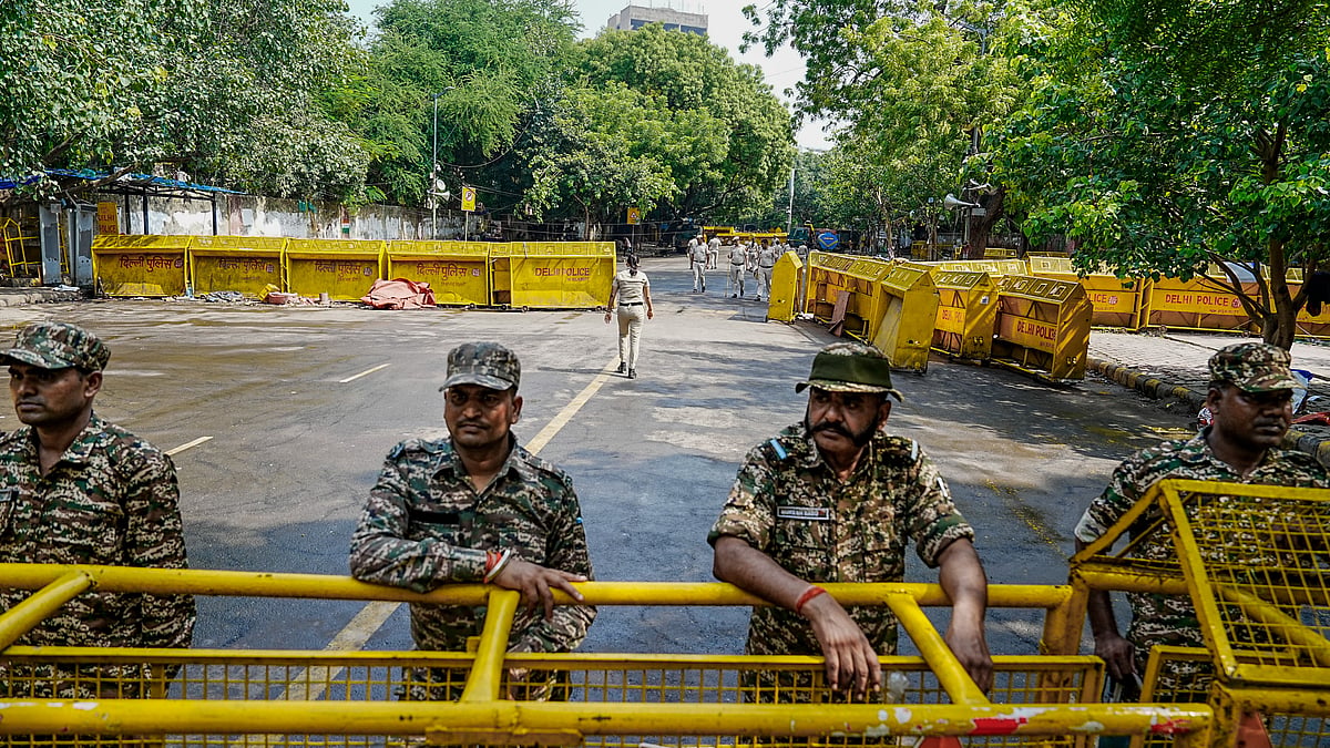 Security personnel keep vigil near the protest site at Jantar Mantar in New Delhi.
