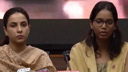 Family members of Delhi policemen address the media