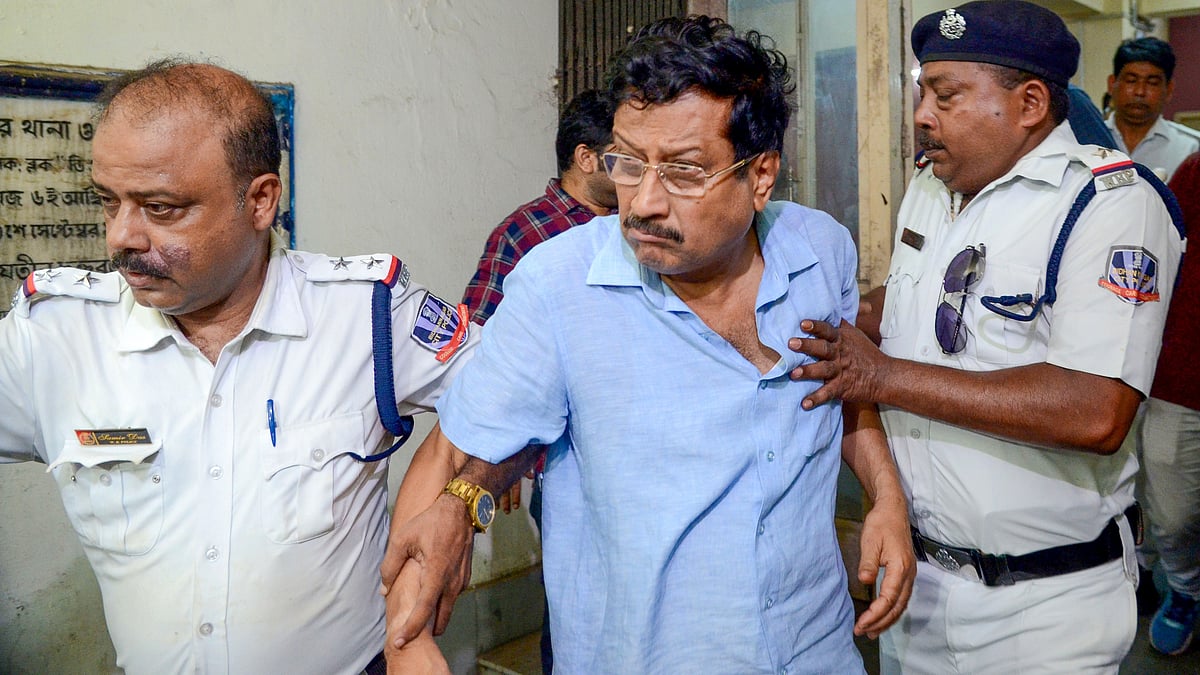Sabyasachi Dutta is escorted from Bidhannagar North Police Station.
