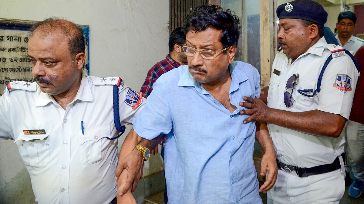 Sabyasachi Dutta is escorted from Bidhannagar North Police Station.