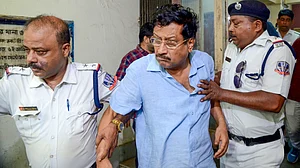 Sabyasachi Dutta is escorted from Bidhannagar North Police Station.