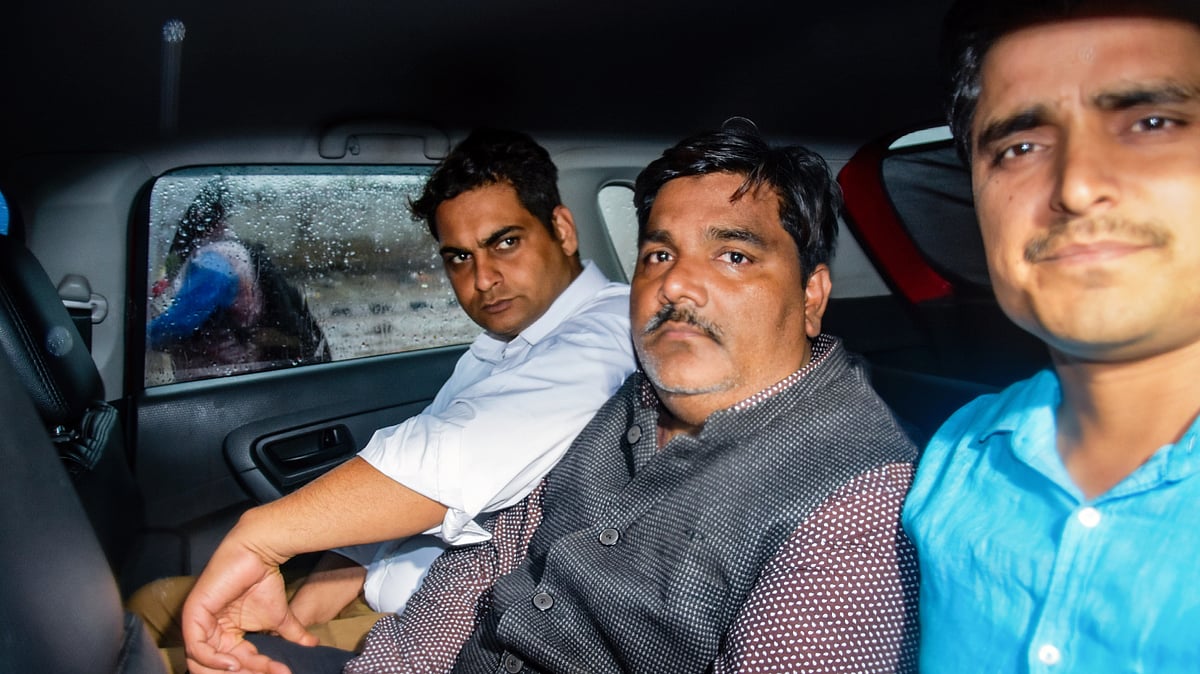 File photo from 6 March 2020 showing Tahir Hussain leaving Sunlight police station, New Delhi