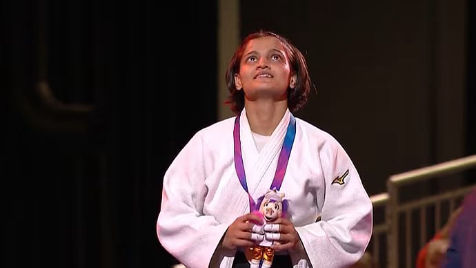 Golden moment: Asmita Dey at the podium on Friday