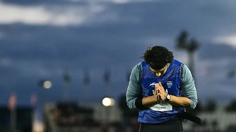 Neeraj Chopra acknowledges the crowd in Glasgow