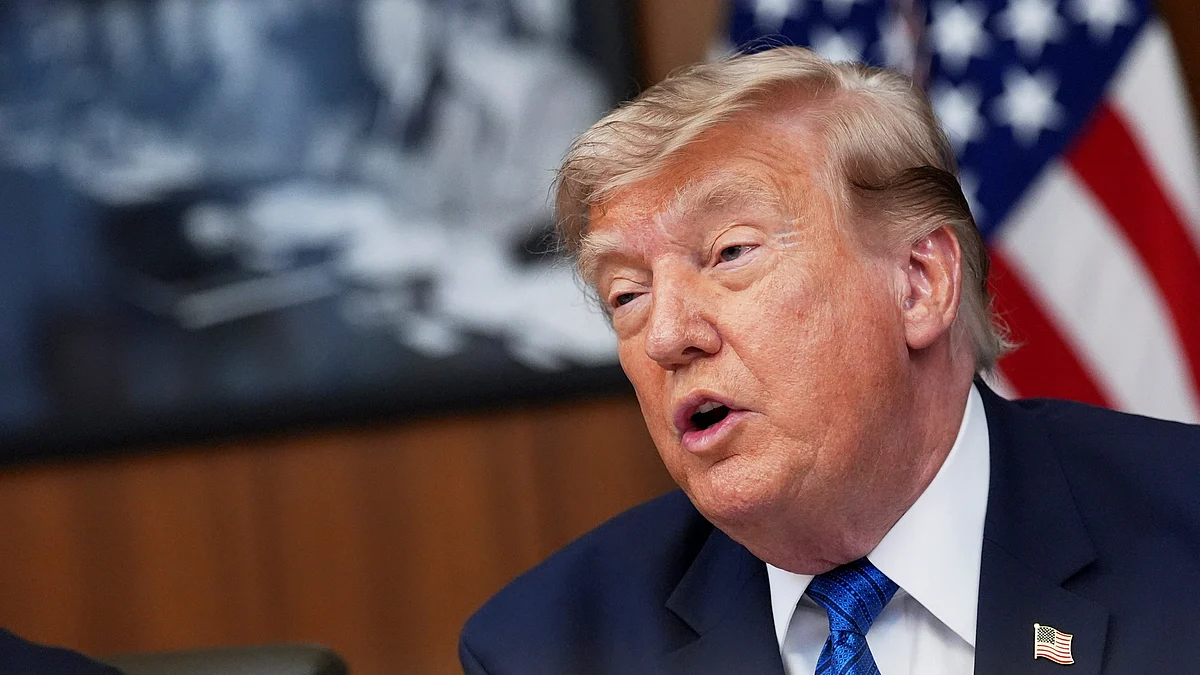 Donald Trump speaks during a cabinet meeting near Thurmont, Md.