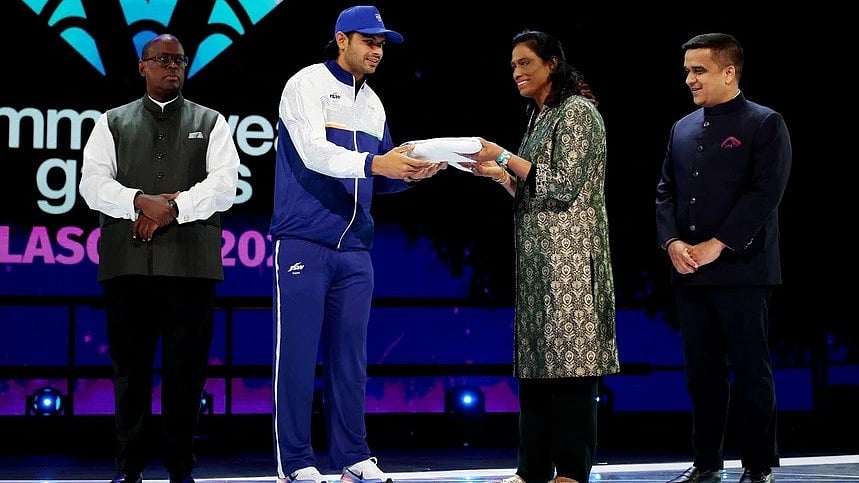 India takes centre stage: Neeraj Chopra and P.T. Usha receive the baton for 2030 Games.