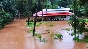 Floodwaters inundate a residential area in Kannur.