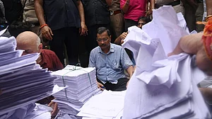 Arvind Kejriwal staging a protest on Firoz Shah Road with 2.30 lakh petitions against E20 fuel