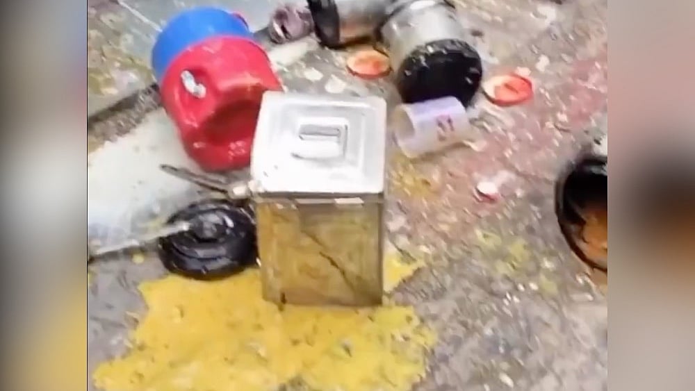 A view of the vendor's wares strewn on the road