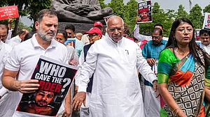 Rahul Gandhi, Mallikarjun Kharge and Opposition MPs protest during Parliament's Monsoon Session.