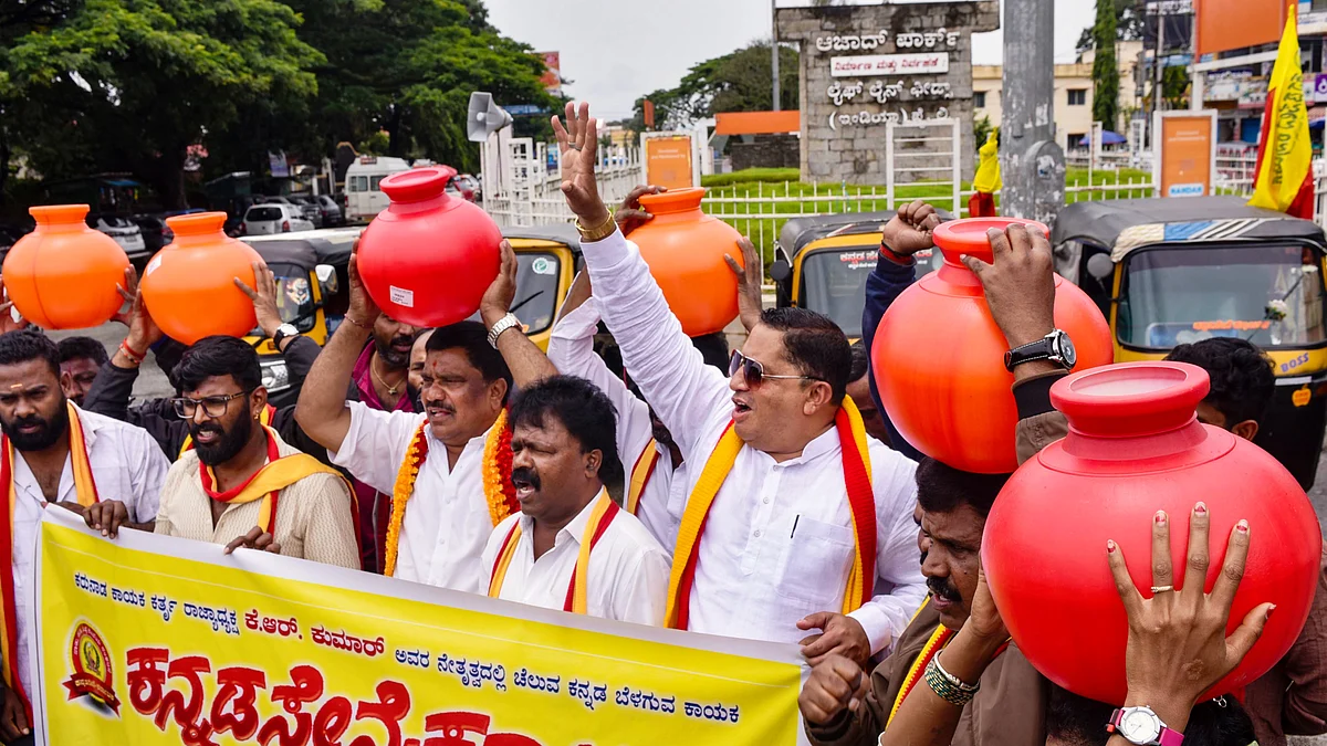 Kannada activists protest the directive to release Cauvery water to Tamil Nadu, in Bengaluru, 1 August