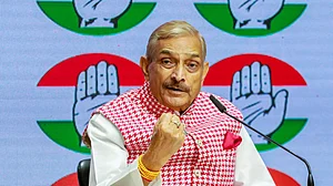 Congress MP Pramod Tiwari addresses a press conference in New Delhi.