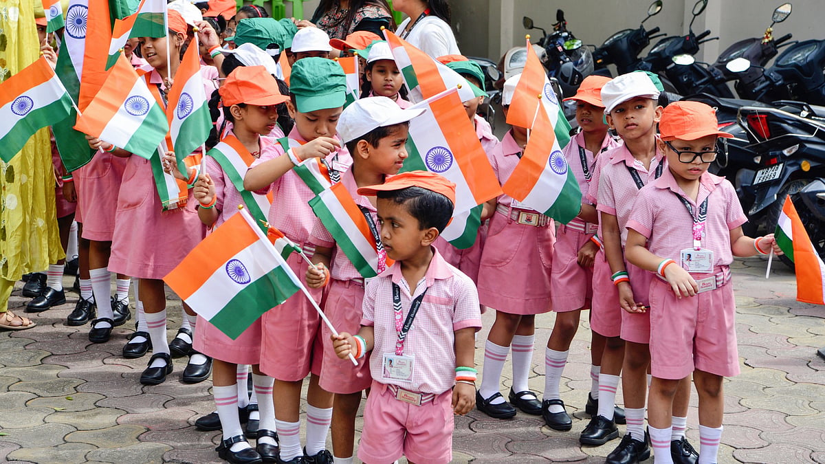 Schoolchildren at a 'Tiranga Yatra' in Siliguri, West Bengal, 14 August