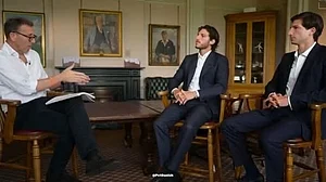 Atherton (left) in conversation with Imran Khan's sons