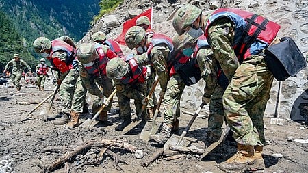 Health experts warn that bodies kept in temporary facilities are rapidly decomposing.